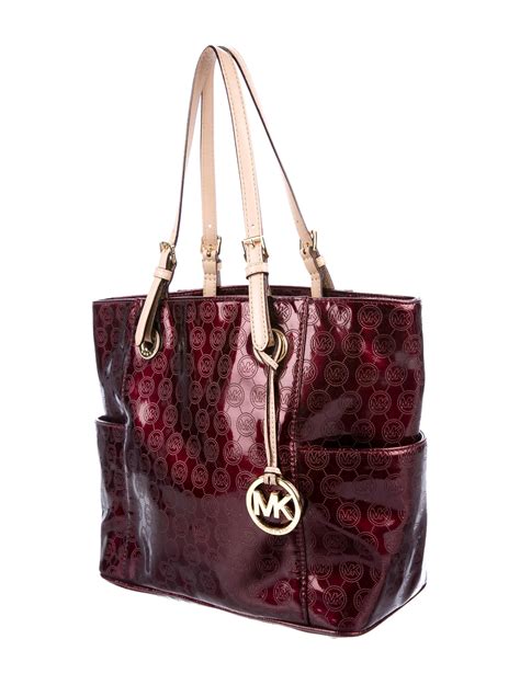 michael kors bags are leather|Michael Kors patent leather bag.